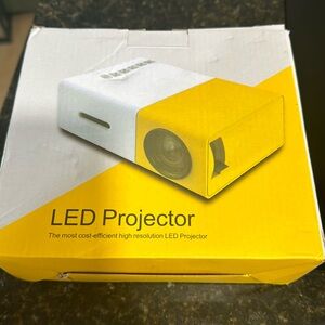 LED PROJECTOR. connect your phone, use with social media. Used one time